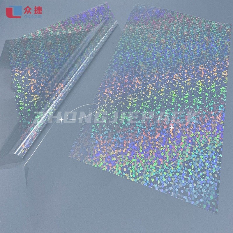 https://www.zhongjiepack.com/wp-content/uploads/2023/06/zinc-zns-transparent-metalized-pvc-hologram-film-foil.jpg